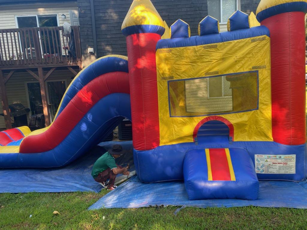 Colorful bounce house available from Champions Rentals